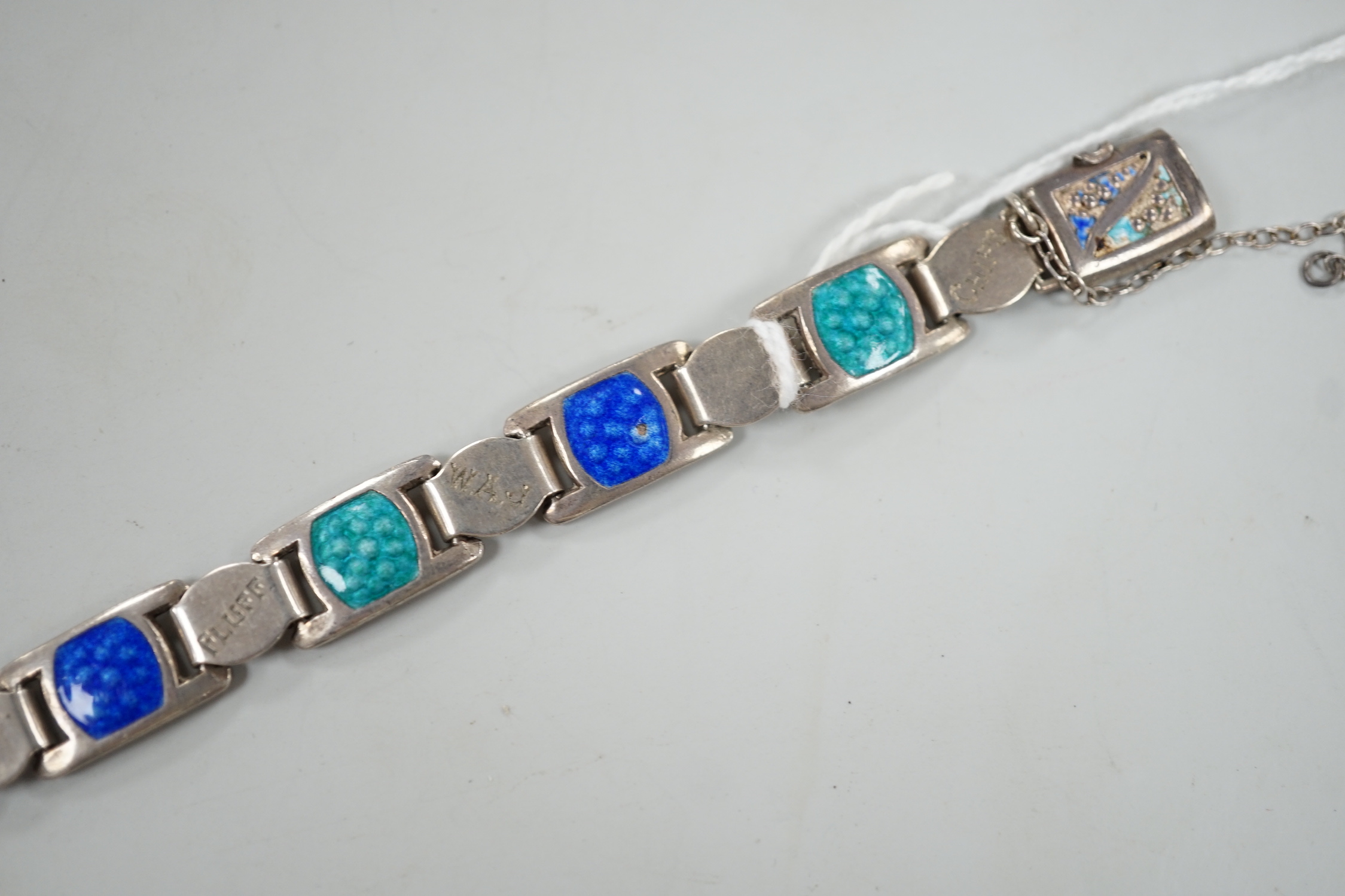 An Edwardian silver and two colour enamel bracelet, engraved with initials and words, 19cm.